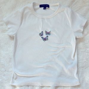 Cropped tshirt with embroidered butterfly’s on the front.